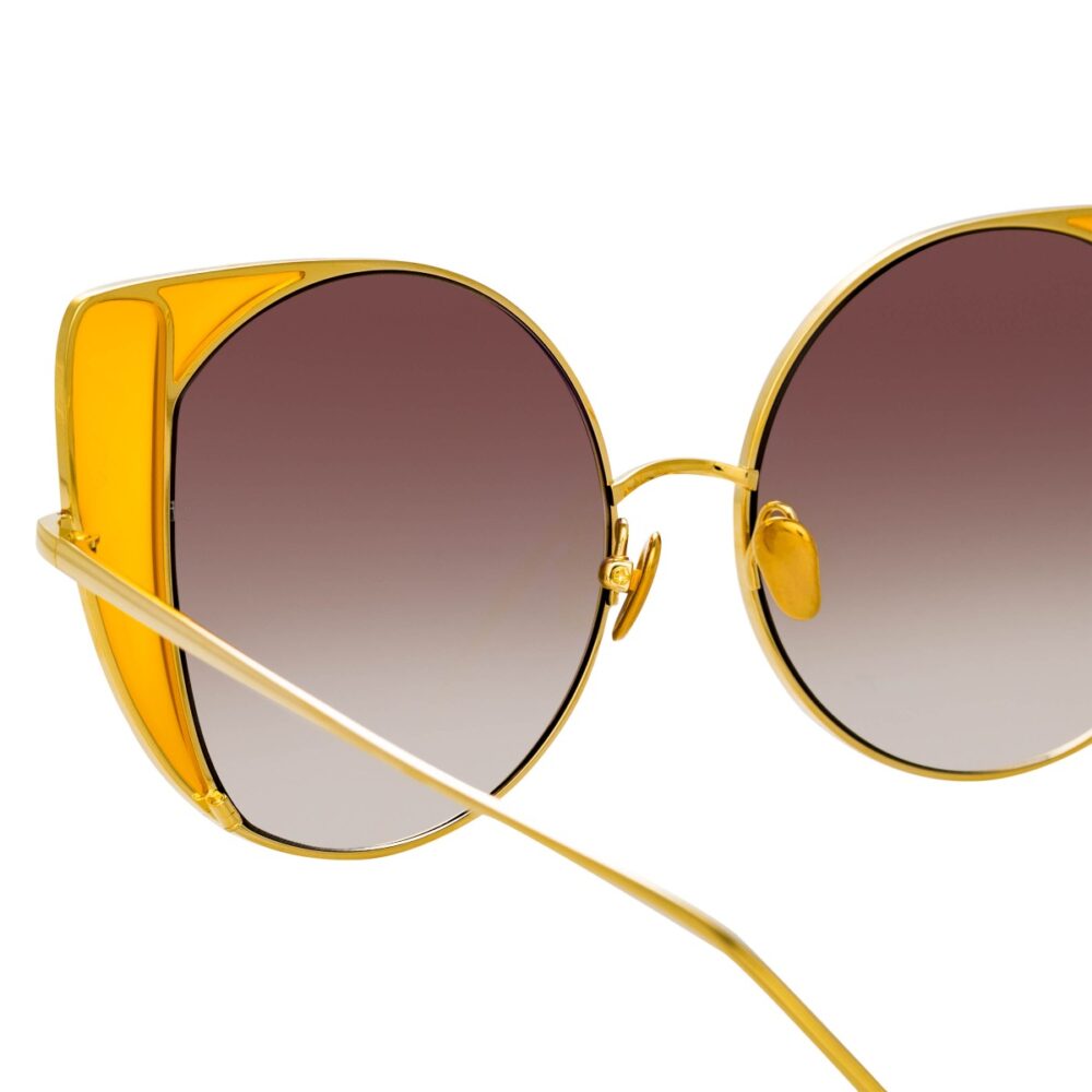 Vergoldete Sonnenbrille mit Cat-Eye-Rahmen und Farbdetail -166802