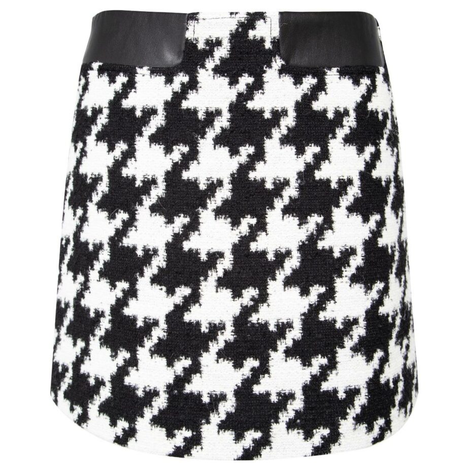 Short skirt with makro-houndstooth print and leather look inlays