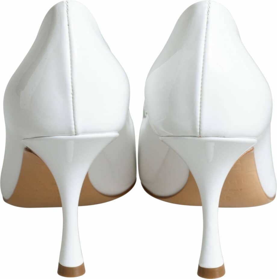 Patent leather pumps with pointed toe caps