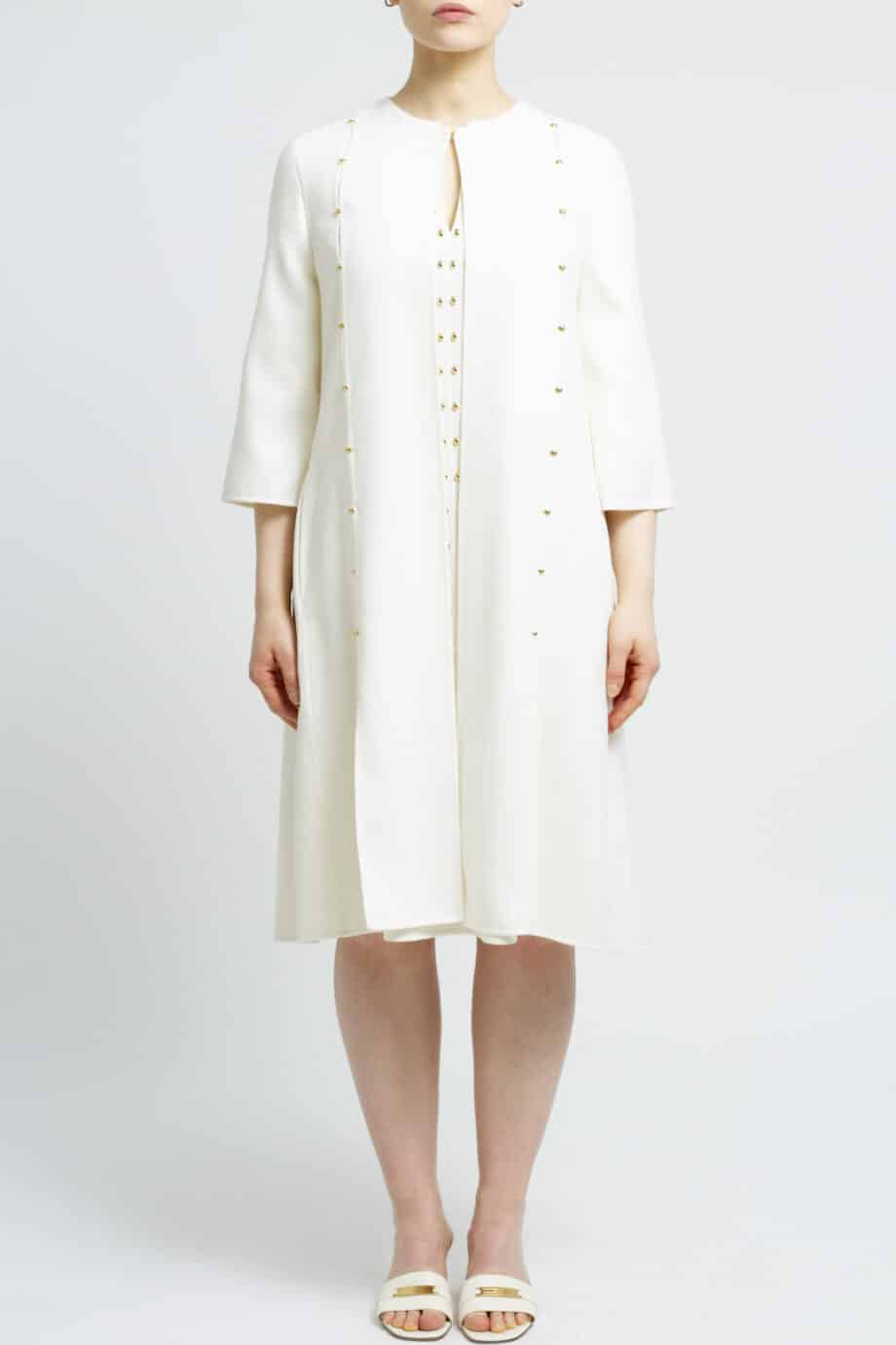 Knee-covering virgin wool dress with delicate stud details