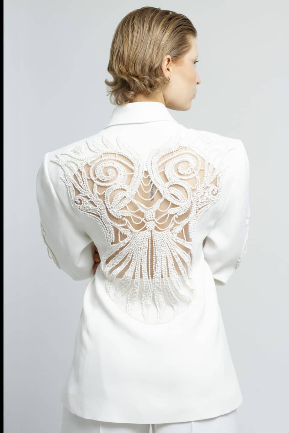 Blazer with shoulder pads and transparent embroidery