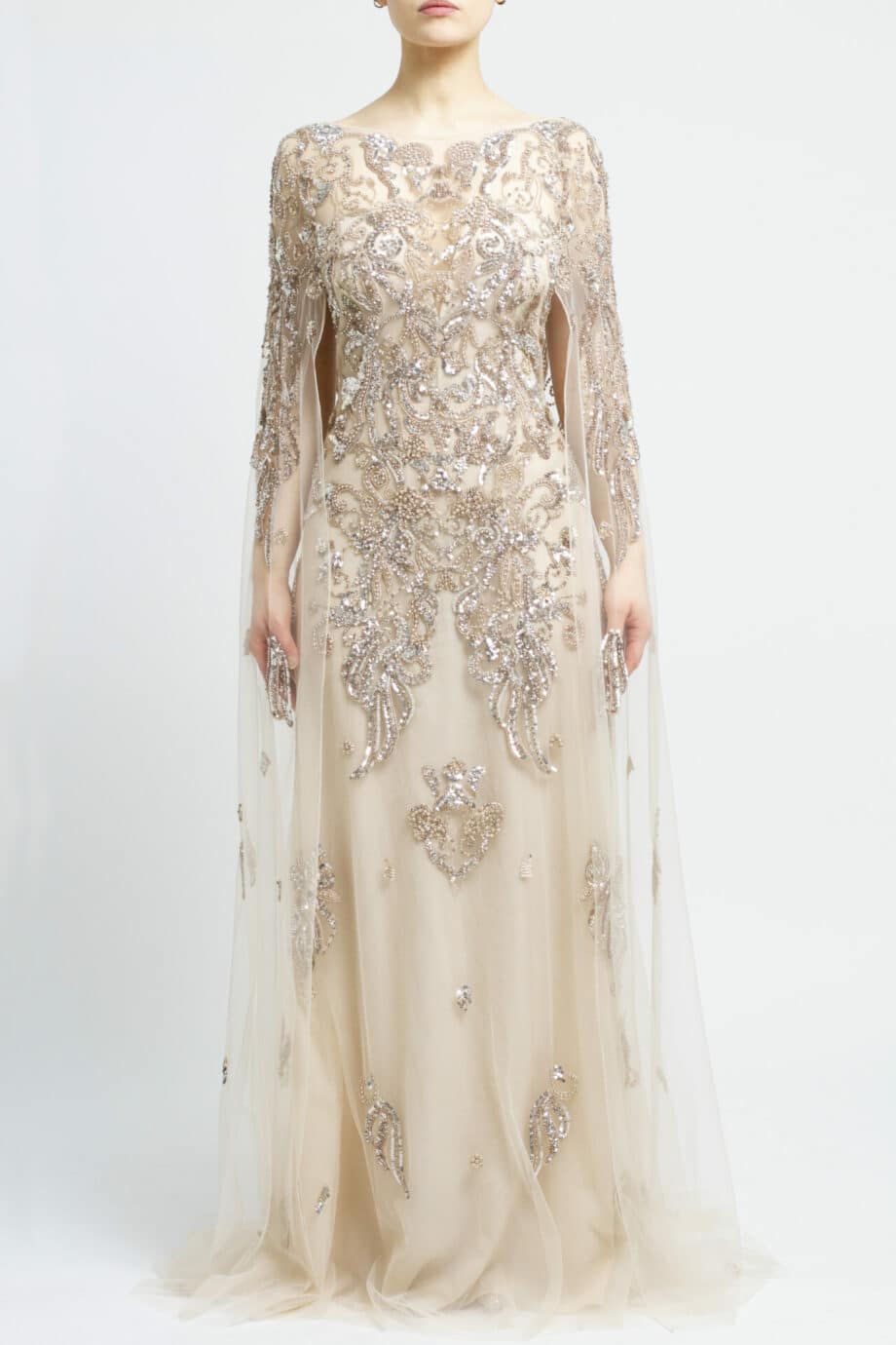 Floor length, fully embroidered gown with cape detail