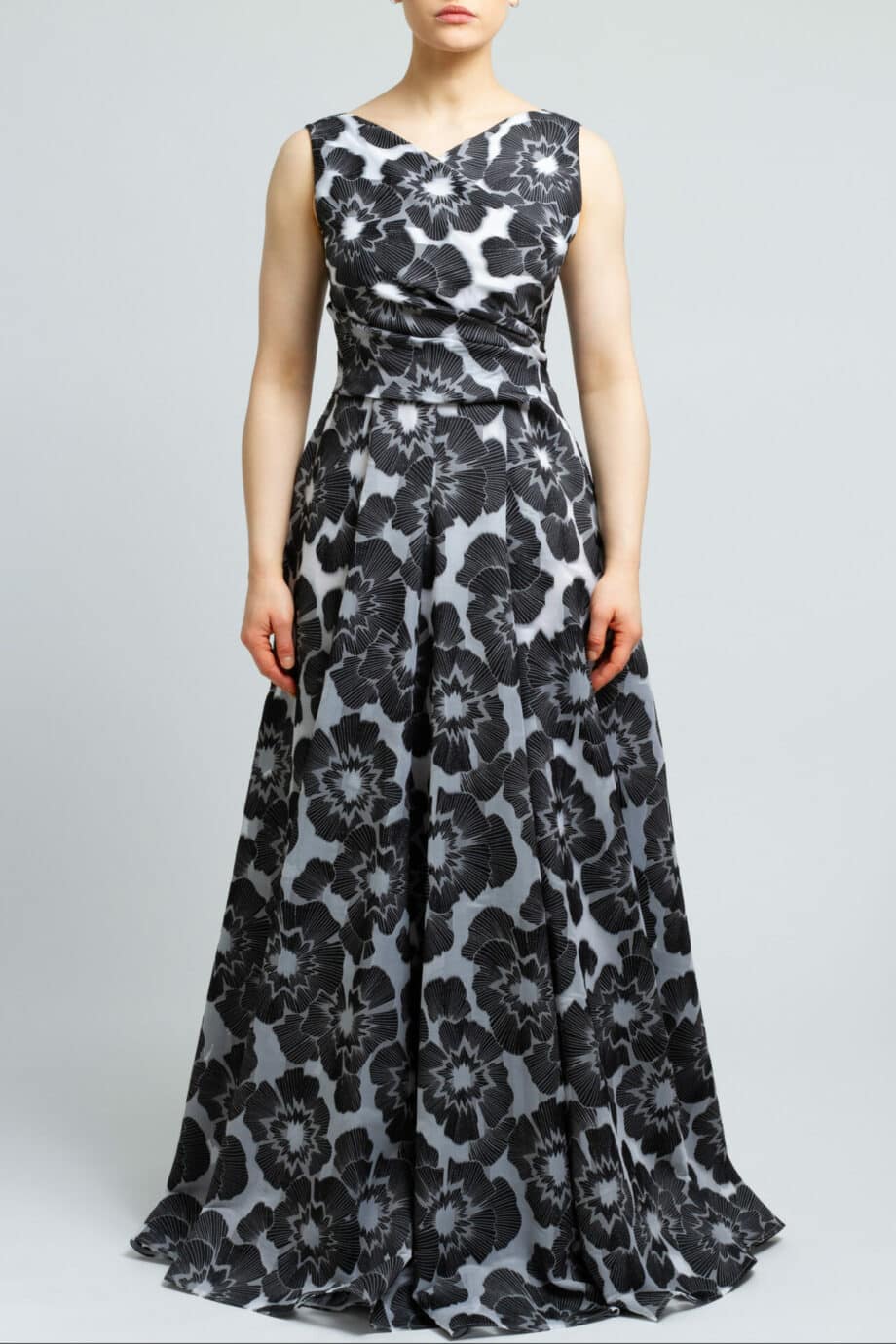 Sleeveless gown with wrapped details and floral print